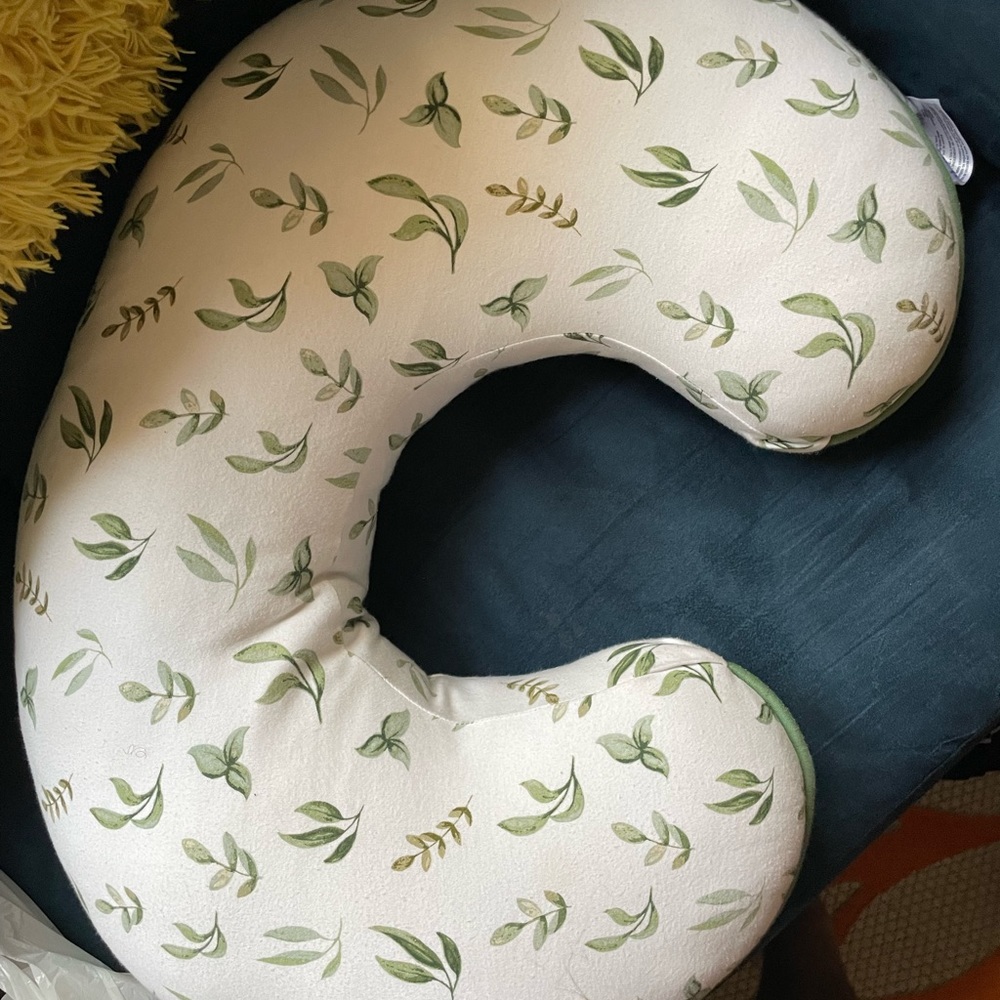 Reversible nursing pillow.